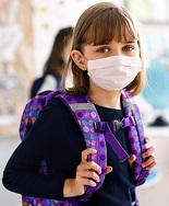 Covid-19, le mascherine a scuola possono mitigare il numero di casi 